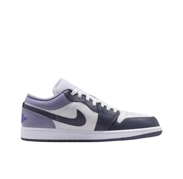 Low-top sneakers with white leather, dark navy side panels, and purple wing detail
