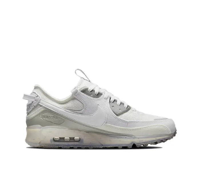 Nike Air Max 90 side profile sneaker in white with translucent cushioning unit