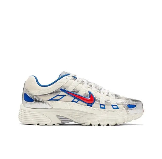 Premium running sneaker side profile, white mesh with blue swoosh and geometric detailing