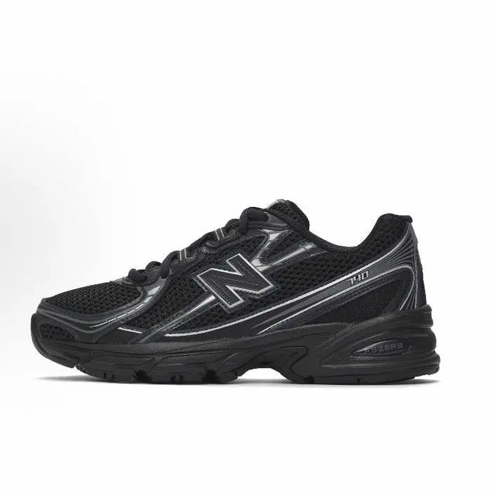 New Balance 740 sneakers in black with N logo and metallic accents