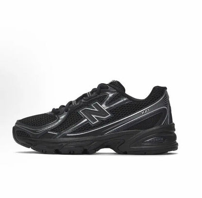 New Balance 740 sneakers in black with N logo and metallic accents