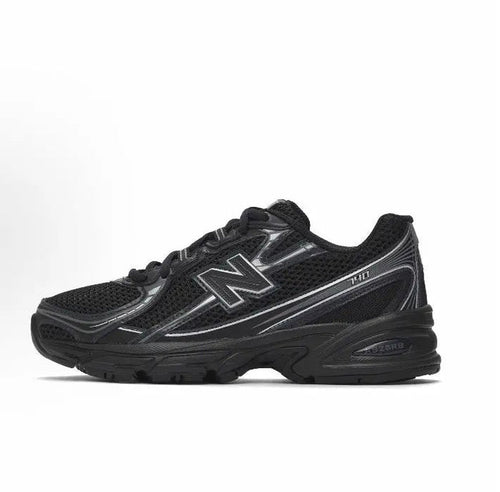 New Balance 740 sneakers in black with N logo and metallic accents