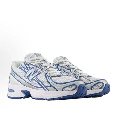 New Balance 740 low-top sneakers in white and light blue, ABZORB detail