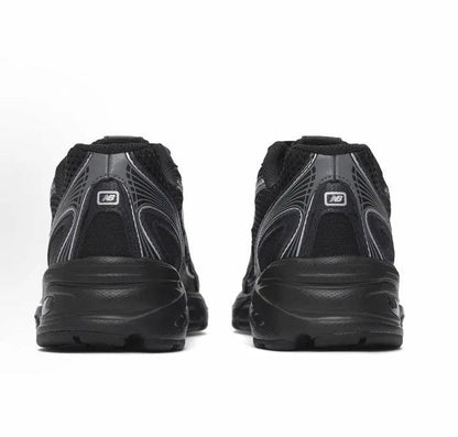 New Balance 740 sneakers, black heel view with cushioned back and tread