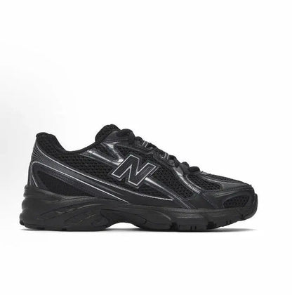New Balance 740 sneakers, black quarter view with reflective N and lace-up