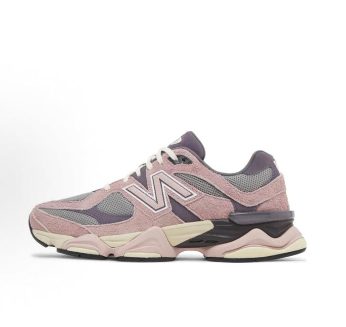 New Balance 9060 running sneaker, pink/grey/lavender, with oversized N logo.