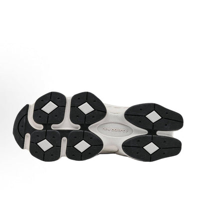 Chunky sneaker outsole with black traction pods and 'new balance' text