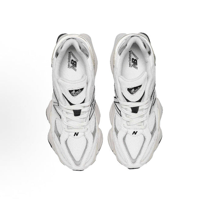 Grey chunky sneakers top view, laces and branded tongue
