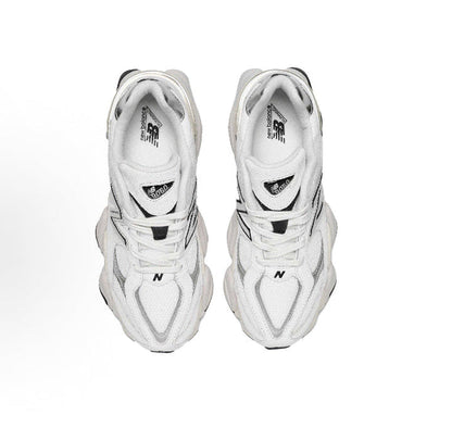 Grey chunky sneakers top view, laces and branded tongue
