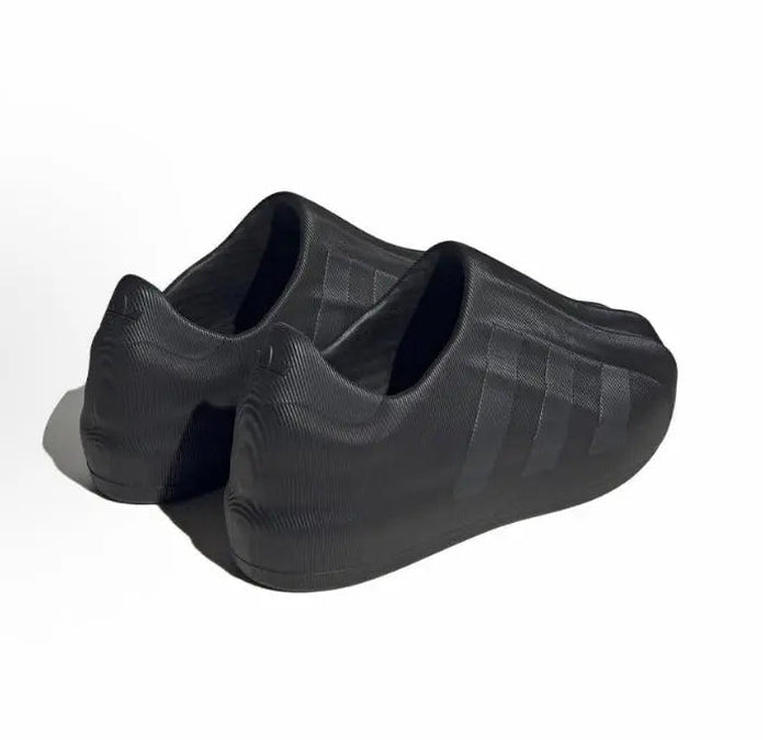 Black Adidas Adifom slip-on showing cushioned heel and sculpted side panels