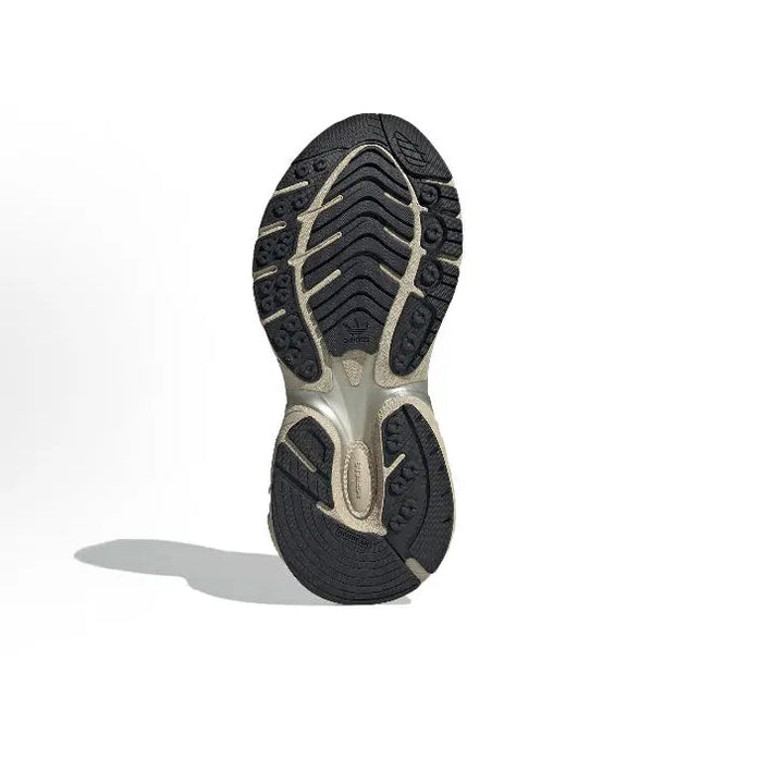 Adistar XLG outsole, black traction with beige tread lines and patterned grip