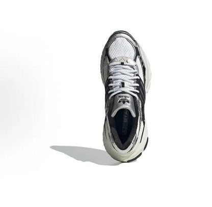 White and dark gray lace-up running shoe with black heel panel and mesh upper