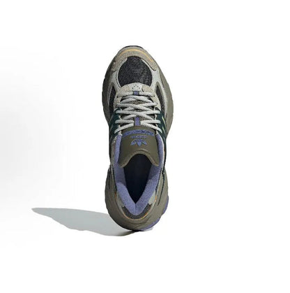 Adidas Adistar XLG sneaker, side view showing lace-up and cushioned heel collar.