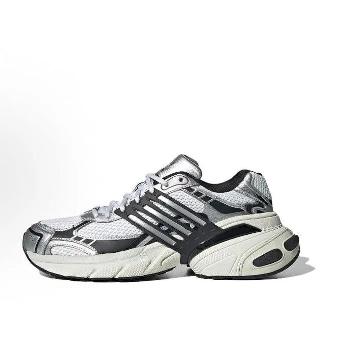 White and dark gray lace-up running shoes with black stripes and chunky sole