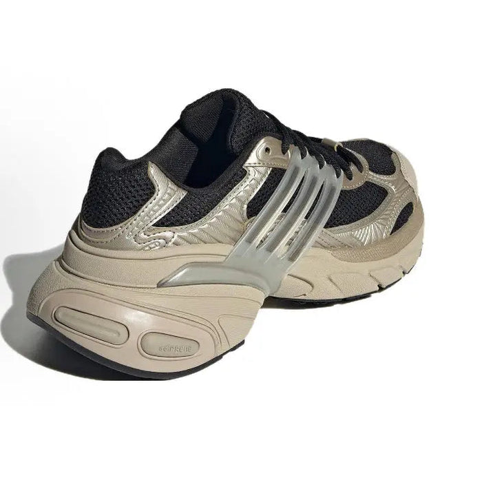 Running sneakers, black and beige with silver stripes, lace-up and padded heel