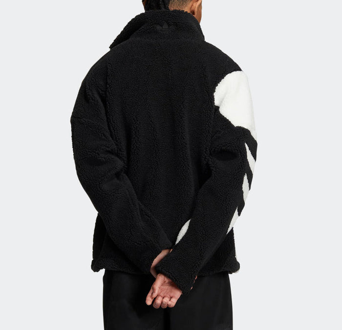 Sherpa track jacket back view, black with white accents at side and sleeve