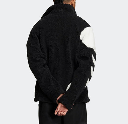 Sherpa track jacket back view, black with white accents at side and sleeve