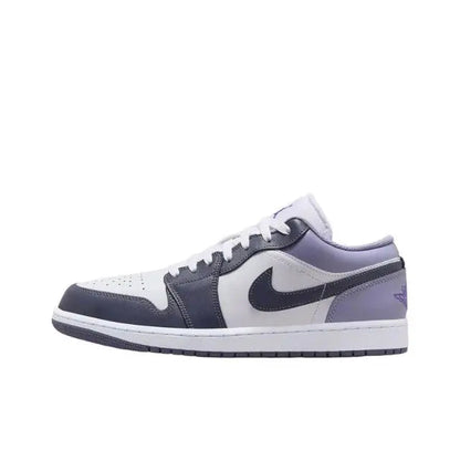 Low-top sneakers in white with navy panels, purple details, and Nike swoosh