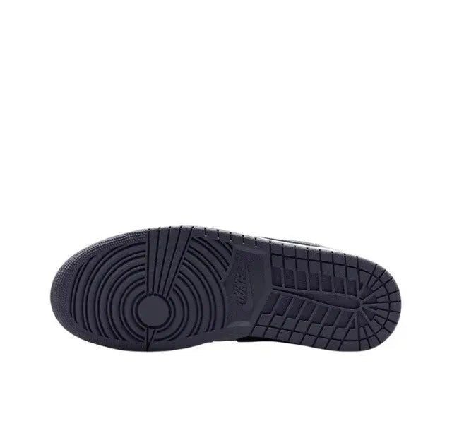 Textured rubber outsole for low-top sneakers with circular tread and grid pattern