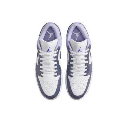 Pair of low-top sneakers with white uppers, navy overlays, and purple Jordan wing