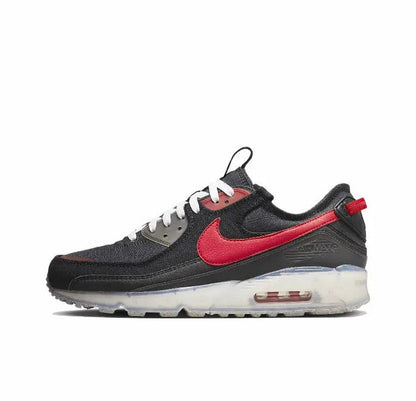 Nike Air Max 90 sneakers, black with red swoosh and white laces; visible air sole