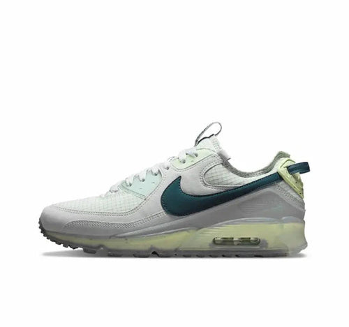 Nike Air Max 90 sneakers, white with teal swoosh and green-tinted sole