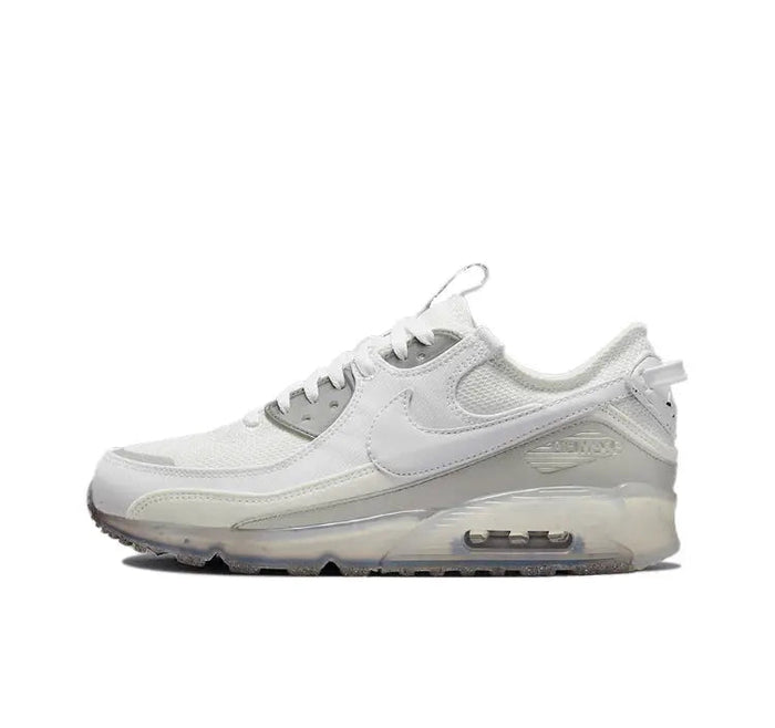 Nike Air Max 90 low-top sneaker in white with blue accents and visible air unit