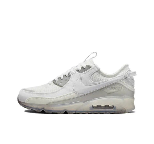 Nike Air Max 90 low-top sneaker in white with blue accents and visible air unit