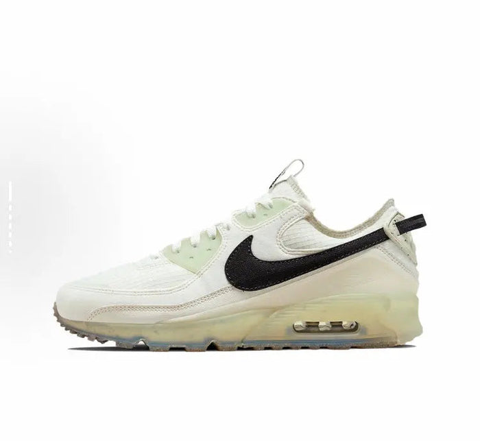 Nike Air Max 90 sneaker with pale white upper, black swoosh, Air-cushion sole
