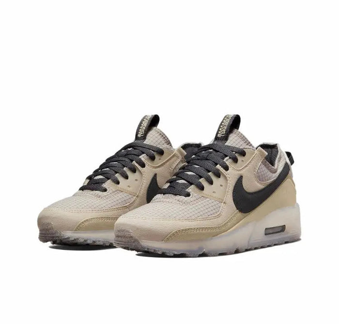 Nike Air Max 90 sneakers, pair view, light beige uppers with black accents and laces
