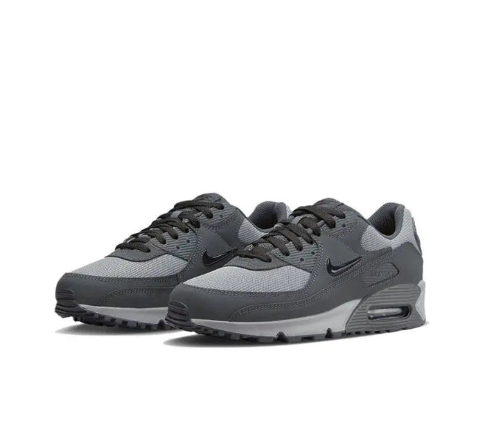 Air Max 90 sneakers, pair view, dark gray knit upper with black Swoosh and gray toe