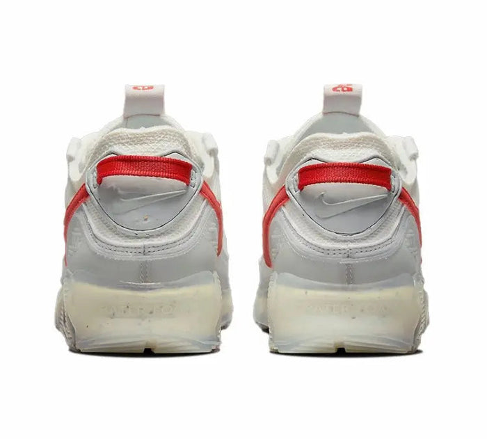 Nike Air Max 90 heel view, white upper with red strap detail and Air unit