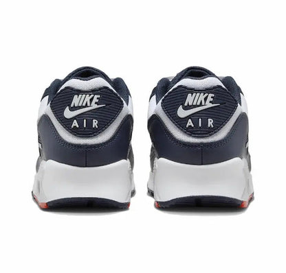 Nike Air Max 90 heel-toe view with navy upper, white midsole, Nike Air branding