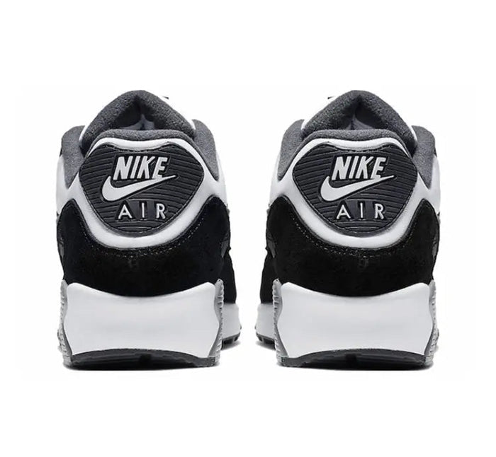 Air Max 90 heel pair, black and white with Nike Air logo on gray suede collar