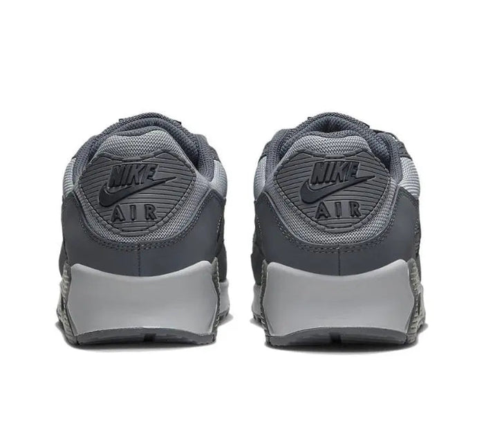 Air Max 90 sneakers heel pair, dark gray uppers with white heel panels and Nike Air