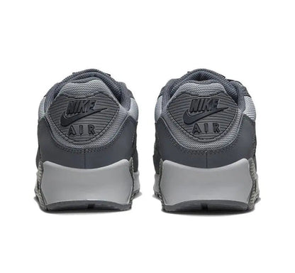 Air Max 90 sneakers heel pair, dark gray uppers with white heel panels and Nike Air