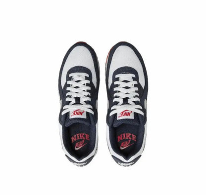 Nike Air Max 90 sneakers with navy-and-white uppers, white laces, tongue and side logos