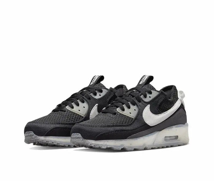 Nike Air Max 90 sneaker, front view with black mesh and white trim