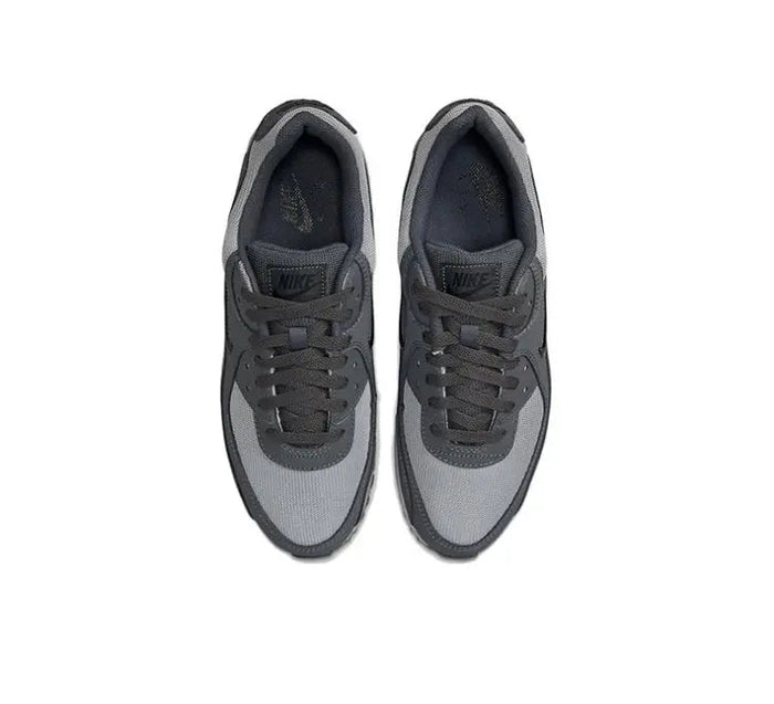 Air Max 90 sneakers pair, dark gray laces and uppers with light gray toe panels