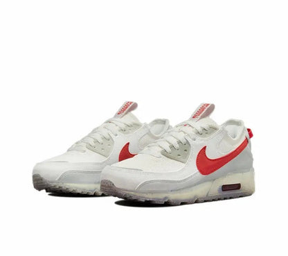 Nike Air Max 90 pair view, white leather with red Swoosh and lace-up