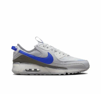 Nike Air Max 90 side view sneaker, white/gray leather with blue swoosh and Air sole