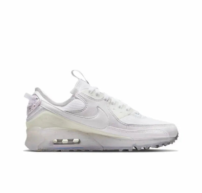 Air Max 90 sneakers, white side profile with Air unit under heel and laces.