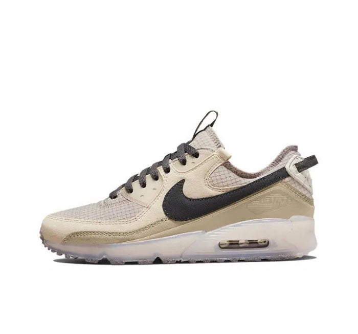 Nike Air Max 90 sneakers side profile, light beige upper with black Swoosh and Air unit