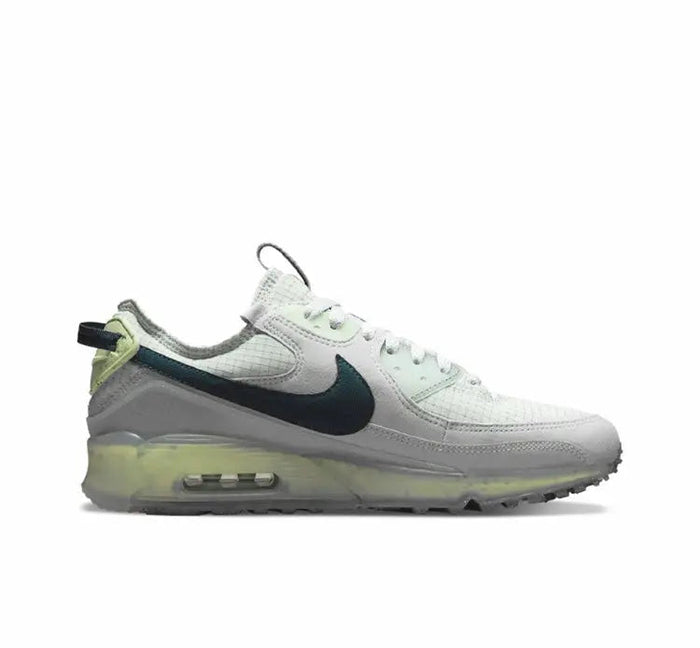 Air Max 90 sneakers side profile, white upper with teal swoosh and green air unit