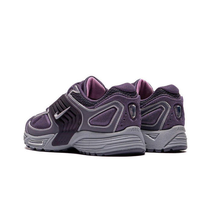 Nike running shoe heel view in dark purple and gray, cushioned back collar