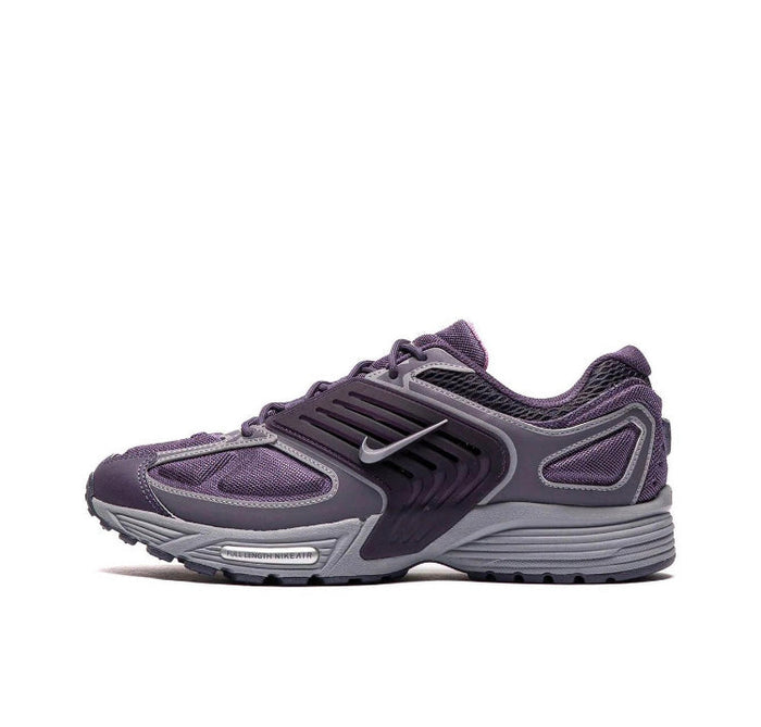 Nike Air Pegasus Wave sneaker side view in dark purple and gray with swoosh