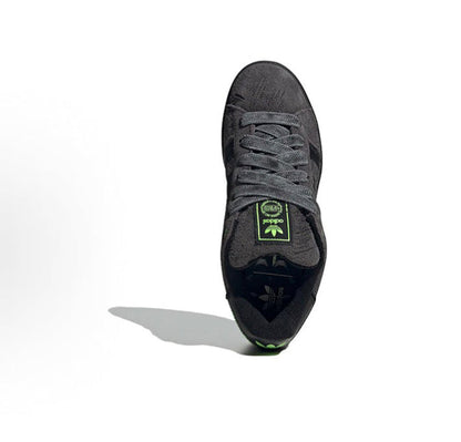 Black lace-up Adidas Campus sneaker with green tongue patch and textured upper