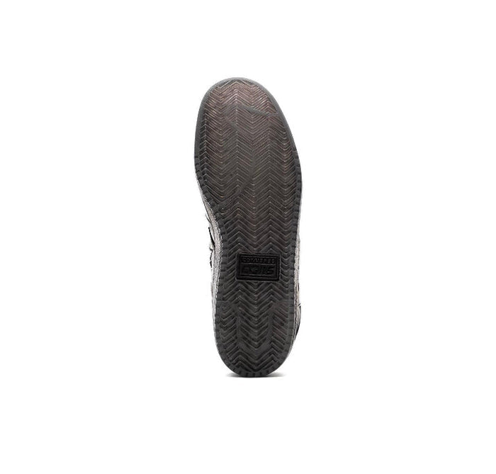 Black sneaker outsole with herringbone tread pattern and brand mark