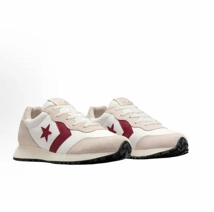 Pair of cream low-top sneakers with dark red side stripes, star logos, black outsole
