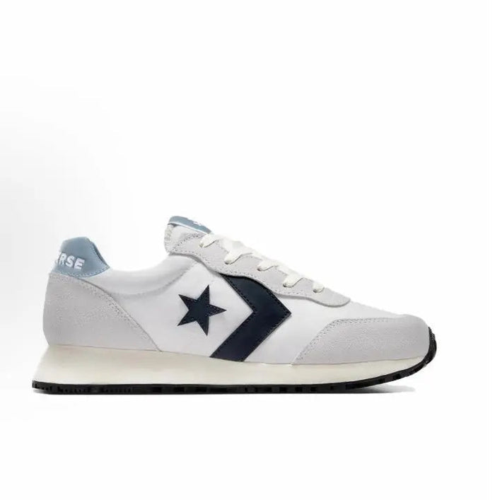 Side view of low-top lace-up sneakers in grey with navy chevron and star emblem